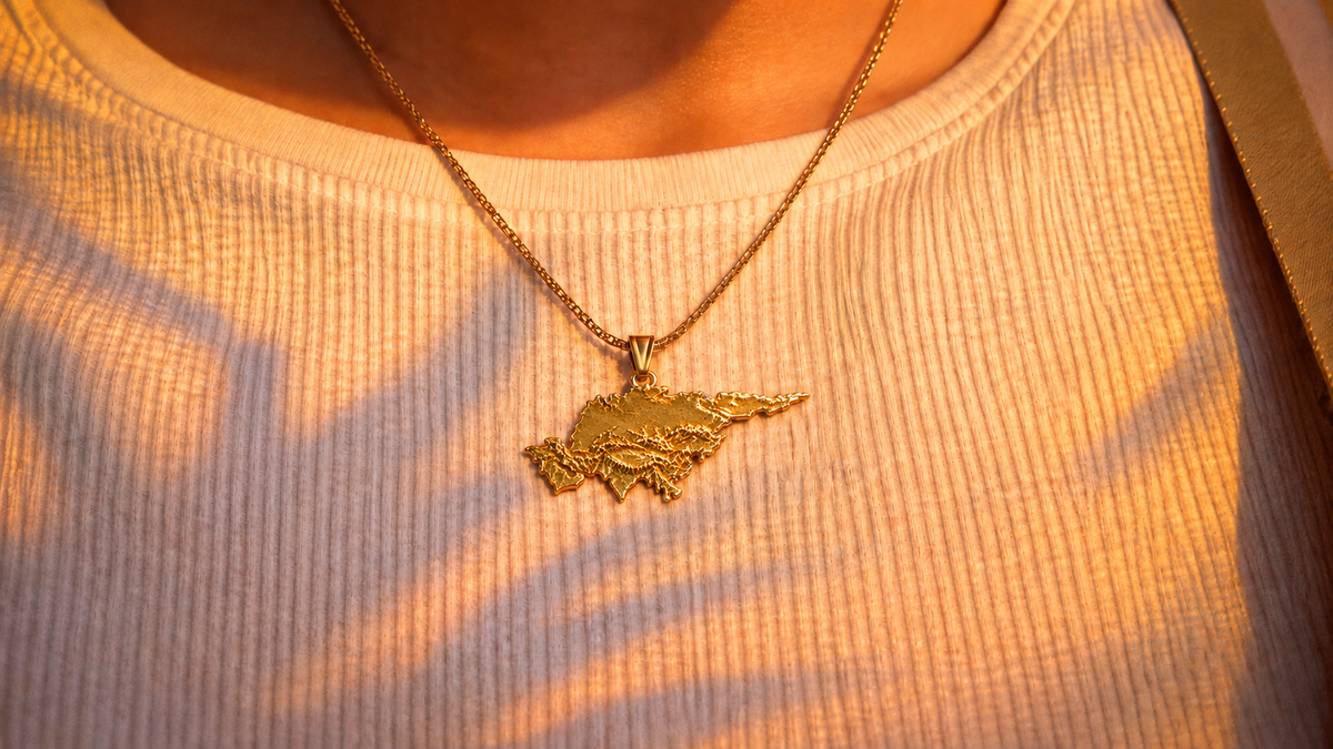 Asia relief pendant in warm sunset light. AI-assisted restoration of the original photograph.